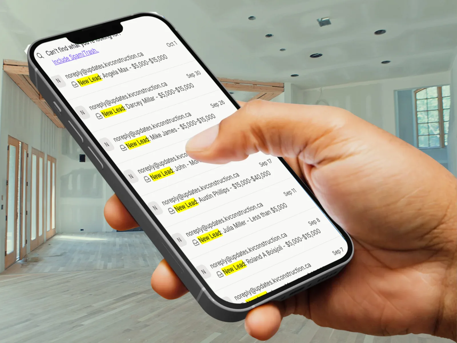 A contractor holding a phone in a home under renovation, its inbox full of New Lead notifications, each with the customer's name and project budget